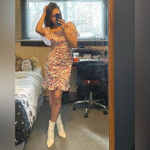 Zara white mini dress with floral ornaments.